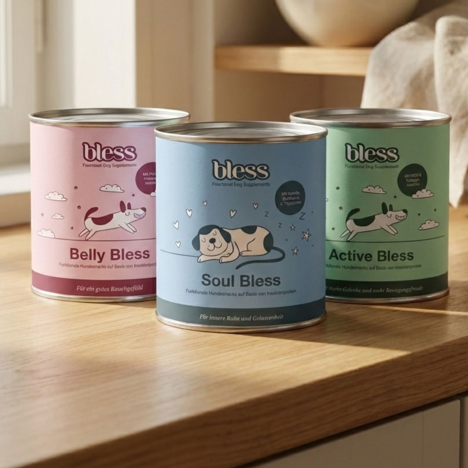 Drei Bless Dosen: Belly Bless, Soul Bless und Active Bless auf Holzfläche